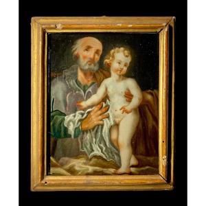 XVIII secolo - Olio sotto vetro - San Giuseppe e il Bambino