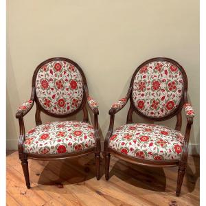Pair Of Louis XVI Period Armchairs In Walnut