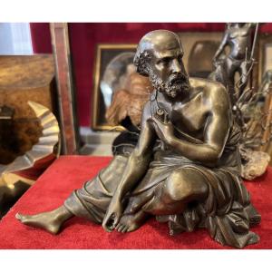 19th Century Bronze, Seated Philosopher Holding A Roll Of Paper In His Hand. Subject In The Antique Style.