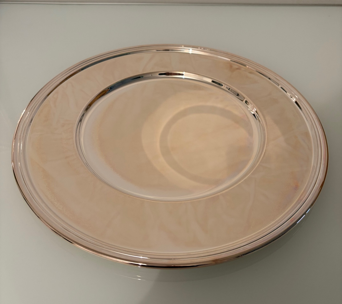 Serie di 16 sottopiatti laminati argento, OLRI 