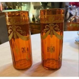 Pair Of Baccarat Crystal Vases Enameled With Fine Gold On An Orange Background