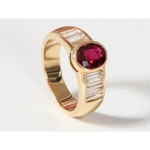 Gold Ring Centered With A Ruby And Diamonds