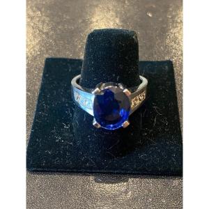 White Gold Ring With Princess Cut Diamonds And Blue Stone 