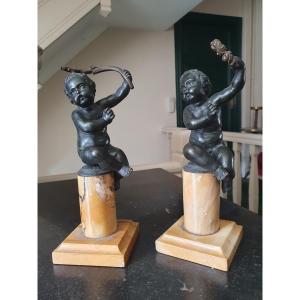  Two Bronze Cherubs
