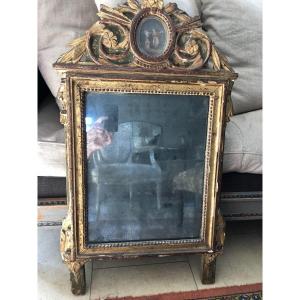 Louis XVI Period Mirror In Golden Wood And Medallion