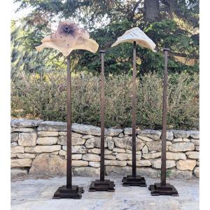 Four Tall Wooden Hat Racks. 1920s-1930s