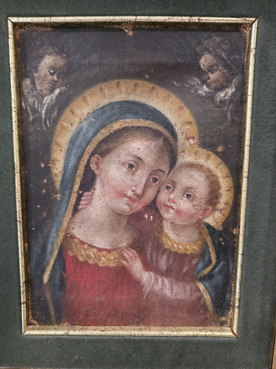 Olio su tela raffigurante Madonna con Bambino del settecento.