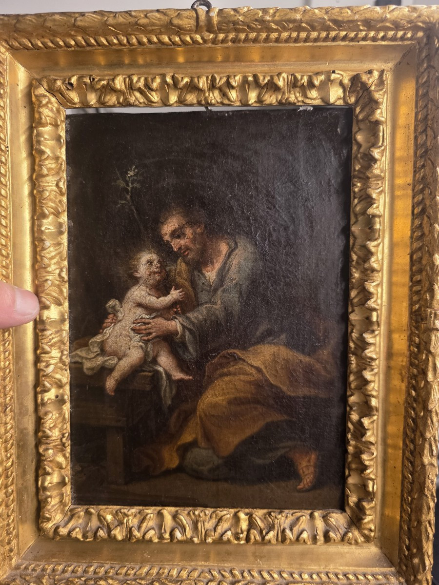 Dipinto raffigurante di San Giuseppe con il Bambino Gesù. Epoca barocca.