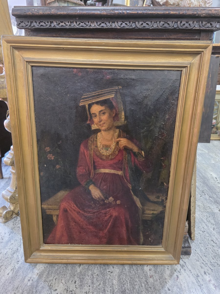 Olio su tela raffigurante una donna del popolo in costume tradizionale dell'Italia centrale.