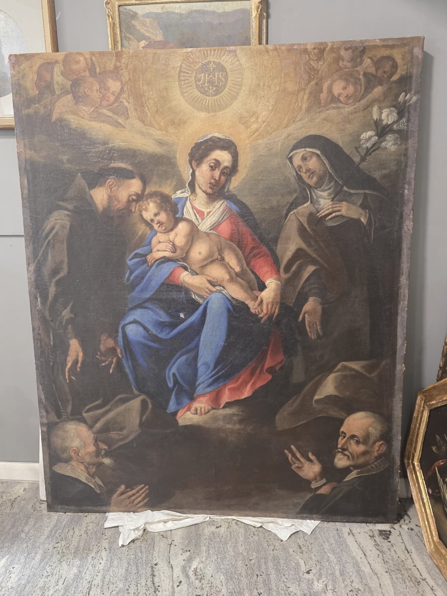 Pala olio su tela del XVII secolo - Madonna col Bambino, Santi Francescani e Committenti