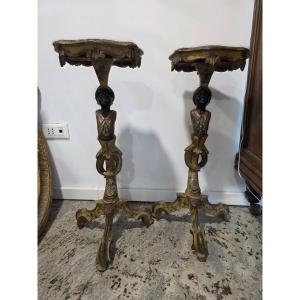 Coppia di trespoli in legno laccato e dorato, Venezia,   XIX secolo.