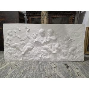 Coppia di grandi bassorilievi in gesso raffiguranti Allegoria di Putti – Fine XIX / Inizio XX