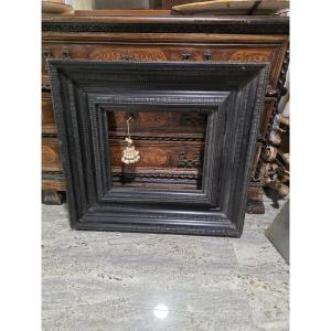 Interessante cornice in legno ebanizzato con modanature guilloché XIX secolo o più antica