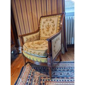 A Very Pretty Bergère Chair In Mahogany And Mahogany Veneer From The Directoire Period.