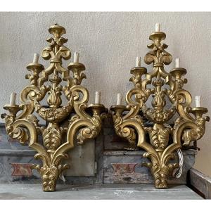 Coppia di punti luce in legno dorato inizio XIX secolo 