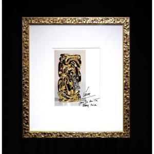 Photo Of A Compression By Sculptor Caesar Signed By The Artist.