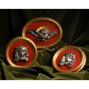 Three Solid Silver Tondi On A Red Jasper Background