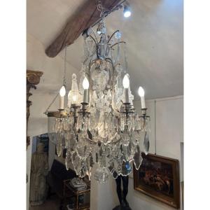 Silver Bronze And Crystal Chandelier With Illuminated Daggers