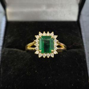 1990s Emerald And Diamond Halo Ring