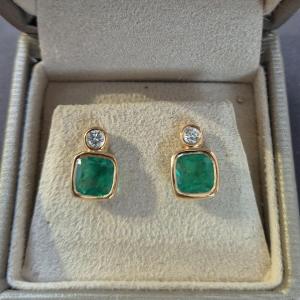 A Pair Of Yellow Gold, Emerald, And Diamond Earrings
