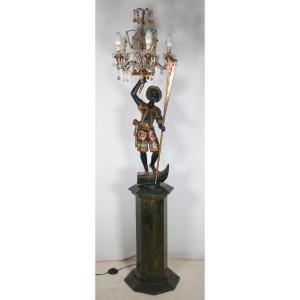 Nubian Man Carrying A Polychrome Wooden Torch From The Late 19th Century.