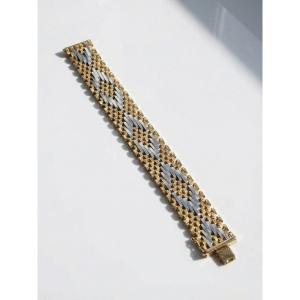 Italian 1980s Woven Mesh Fancy Cuff Bracelet In Gold And Silver Metal