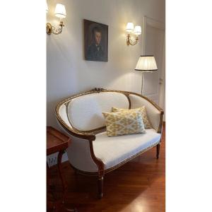 Ampio canapè due posti Napoleone III di stile Luigi XVI in legno dorato rimesso a nuovo