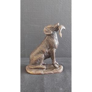 Bronze Statue Of A Dog Bringing Game To Its Master