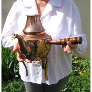 18th Century Copper Tripod Jug.