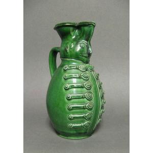 Anthropomorphic Pitcher With Green Glaze.