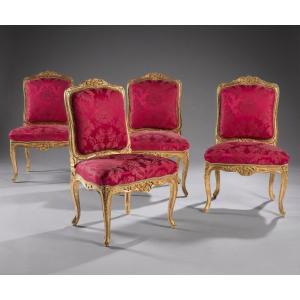 Suite Of Four Louis XV Carved And Gilded Wood Chairs