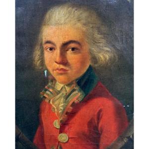 Portrait Of A Young Boy In A Red Suit