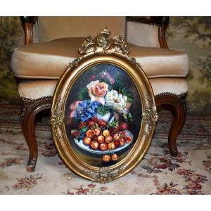 Still Life With Fruit And A Bouquet Of Flowers In An Oval Louis XV Rocaille Style Frame.
