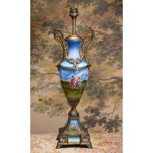 Earthenware Lamp Base Decorated With Figures And Cherubs On A Gilded Spelter Base From The Late 19th Century