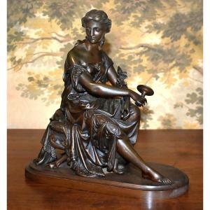 Bronze Subject, Seated And Draped Female Statue In Antique Style, 19th Century Brown Patina Sculpture