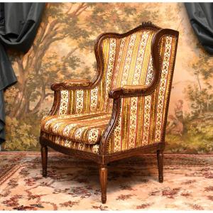 Louis XVI Style Bergère Chair With Ears In Lacquered And Gilded Wood, Antique Gold Finish, Napoleon III Period. 