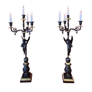Pair Of Restoration Period Torches Representing Two Winged Cupids With Brown Patina