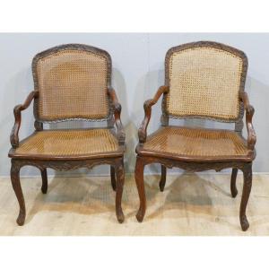 Pair Of Canned Armchairs Louis XV Period In Carved Beech, XVIIIth Century