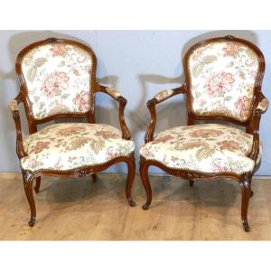 Pair Of Armchairs A La Reine Louis XV Period In Carved Walnut, XVIIIth Century