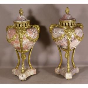 Pair Of Louis XVI Cassolettes In Veined Pink Marble And Gilt Bronze With Rams, 19th Century