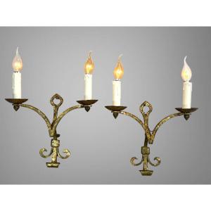 Pair Of Wall Lights By Robert And Roger Thibier 20th Century In Hammered And Gilded Iron