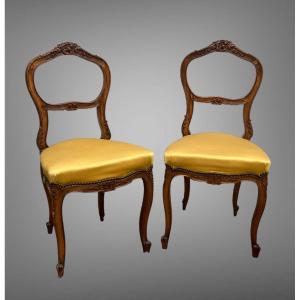 Pair Of Antique Louis XV Style Walnut Bedroom Chairs From The 1900s