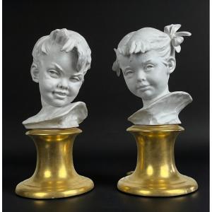 Pair Of Biscuit Child Busts Signed Bruno Merli On Porcelain Base