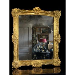 Large 18th Century Mirror In Carved And Stuccoed Gilded Wood With Mercury Glass