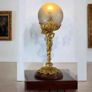 19th Century Gilt Bronze Lamp Depicting A Double-tailed Triton On A Marble Base