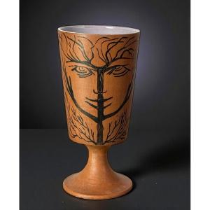A Footed Vase In Glazed Ceramic, Signed Jean Marais, Decorated With A Face.