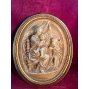 Virgin With A Chair In Half-round Wax