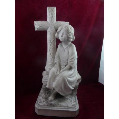 Young Child In Biscuit Near D Cross