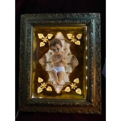 Child Jesus Glass Eyes In A Light Box