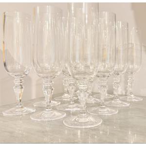 12 Champagne Flutes, Signed Cristal Sèvres. 